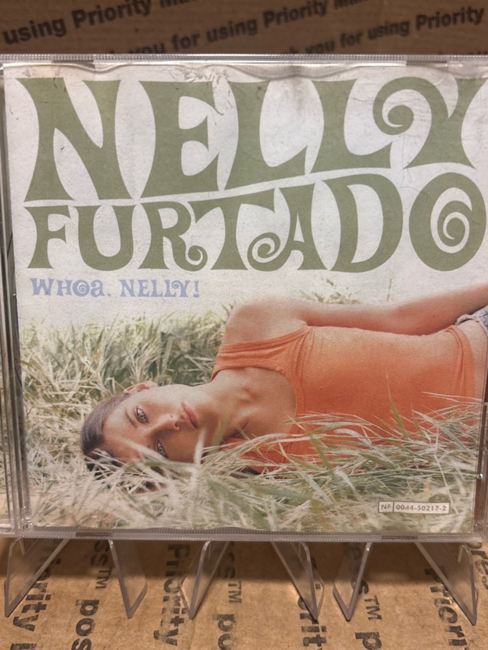 DreamWorks Nelly Furtado CD Cover — Orange and Green Artwork